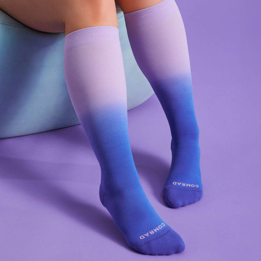 Comrad Knee-High Compression Socks, Ombre, Purple/Denim – shown worn