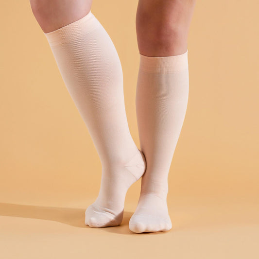 Comrad Knee-High Compression Socks, Solid 20-30 mmHg, Rose – shown worn