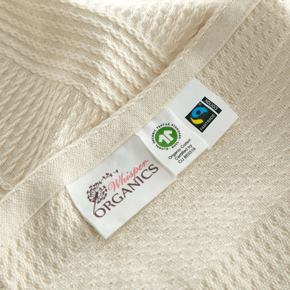 Whisper Organics Organic Cotton Throw with Tassels – product photo