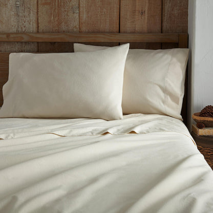 Whisper Organics Organic Flannel Sheet Set, Natural – foot-of-bed view