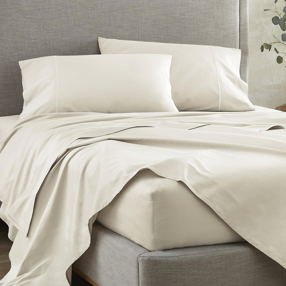 Whisper Organics 500 TC Organic Sateen Fitted Sheet – on a bed