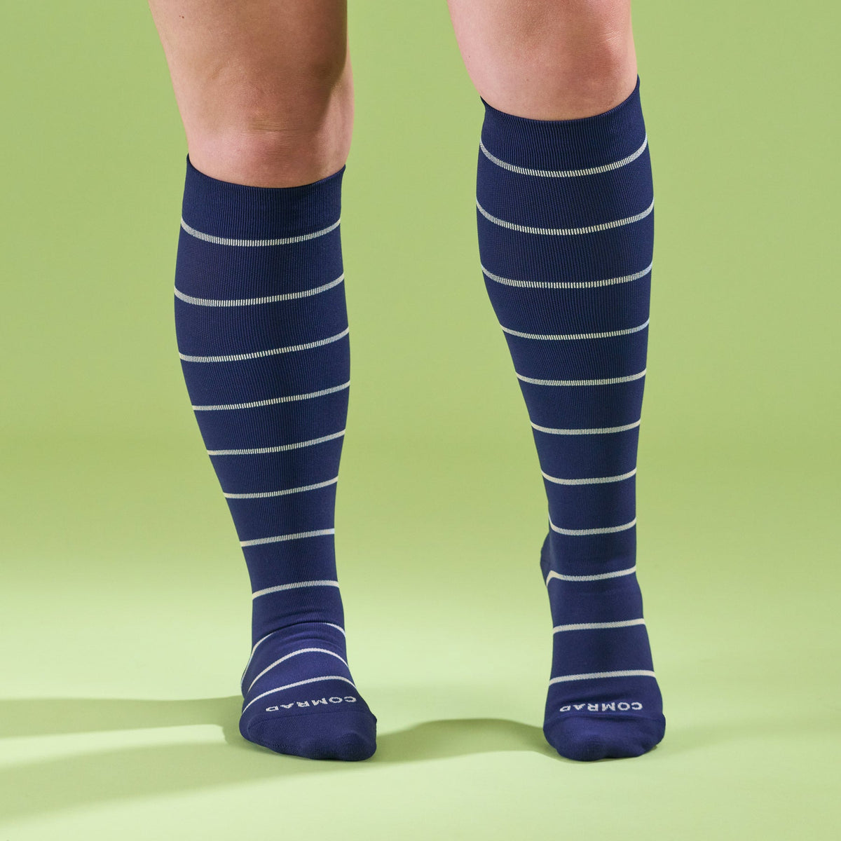 Comrad Knee-High Compression Socks, Stripes, Navy/Sand – shown worn