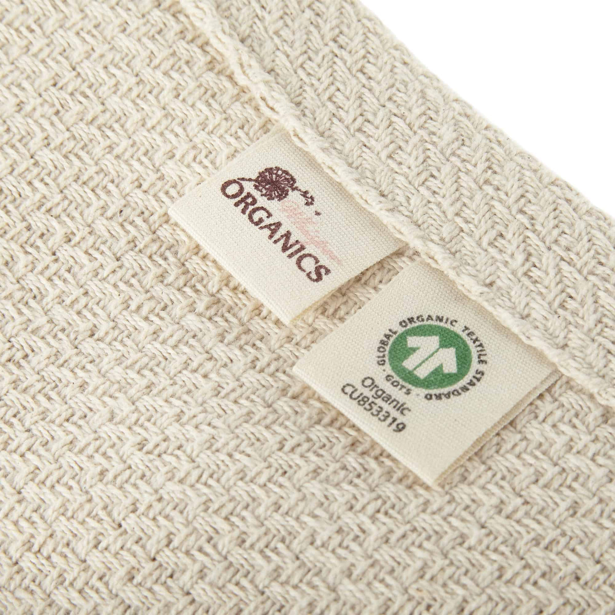 Whisper Organics Organic Cotton Woven Blanket – label close-up
