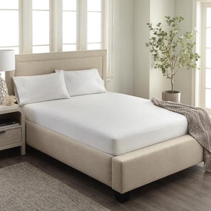 Whisper Organics Organic Waterproof Pique Knit Mattress Cover – on a bed