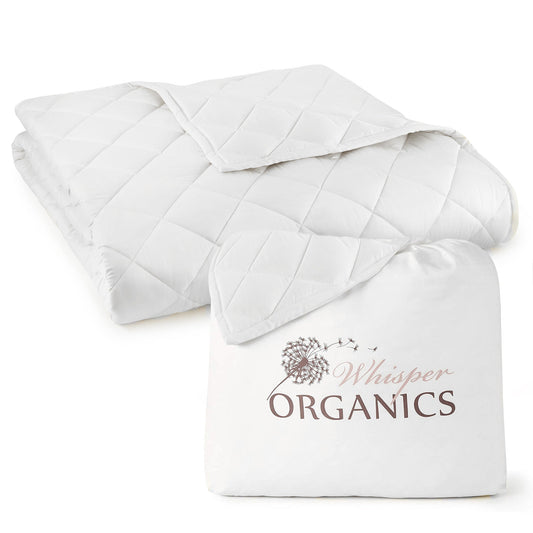 Whisper Organics 240 GSM organic cotton comforter in white, folded beside its branded storage bag