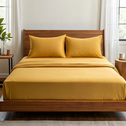 Bamboo is Better Copper Infused Bamboo Sheet Set, Mustard – on a bed