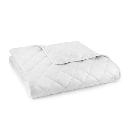 Folded white 240 GSM organic cotton comforter showing diamond stitching
