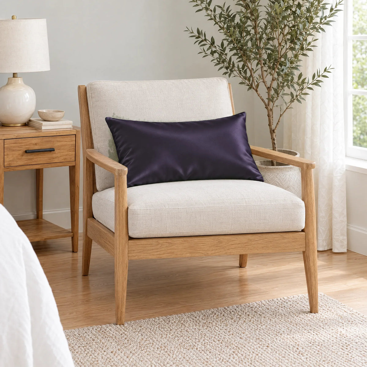 Bamboo is Better Cooling Bamboo Travel Pillowcase, Royal Purple – on an armchair
