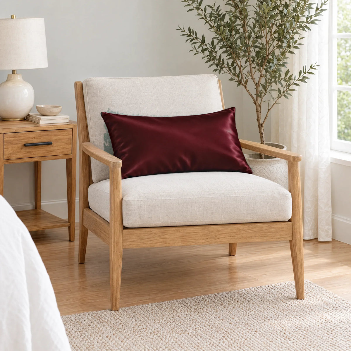 Bamboo is Better Cooling Bamboo Travel Pillowcase, Ruby Red – on an armchair