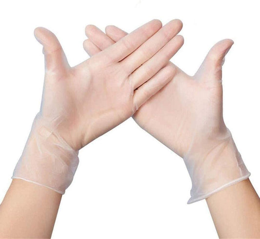 Hands wearing clear powder-free vinyl disposable gloves